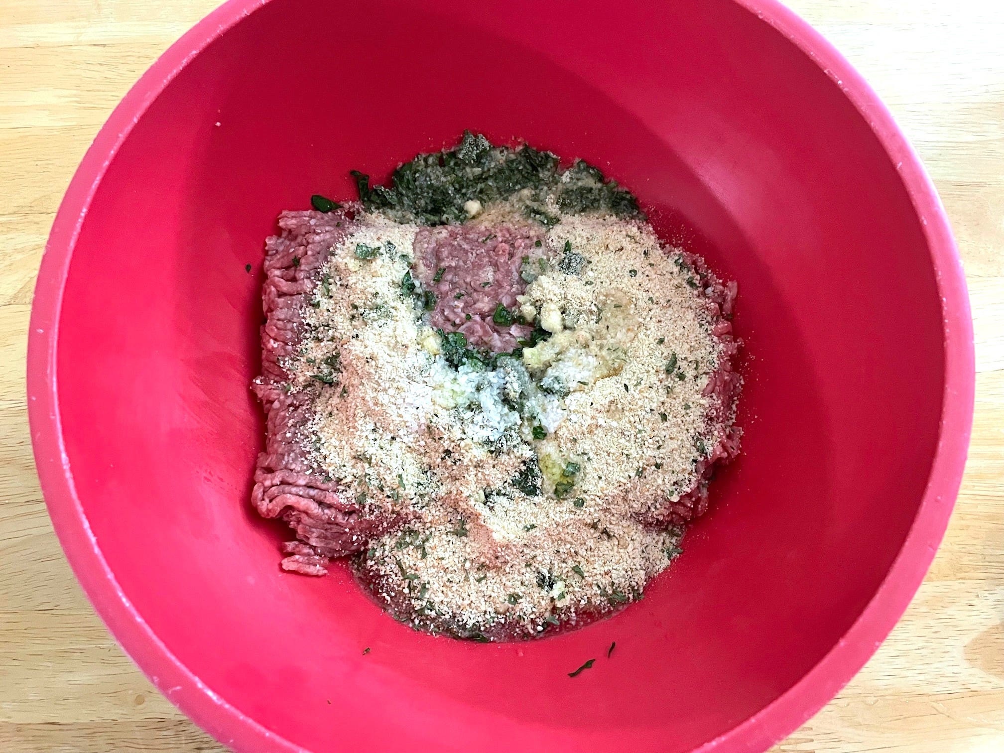 Prepping the meat for Anneta's dad's Greek meatballs