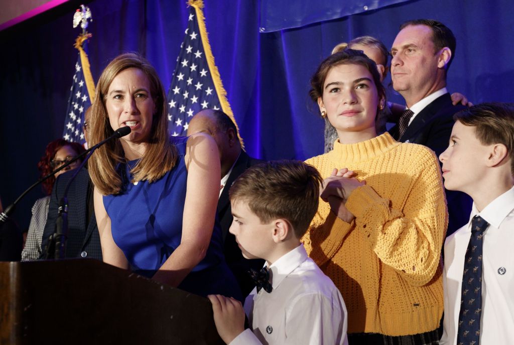 Mikie Sherrill with her husband and children at her election night event.