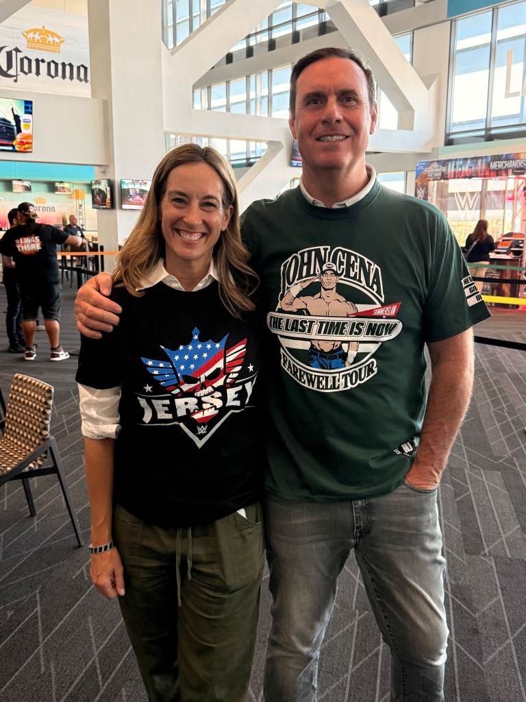 Mikie Sherrill and husband Jason Hedberg attending WWE SummerSlam 2025.
