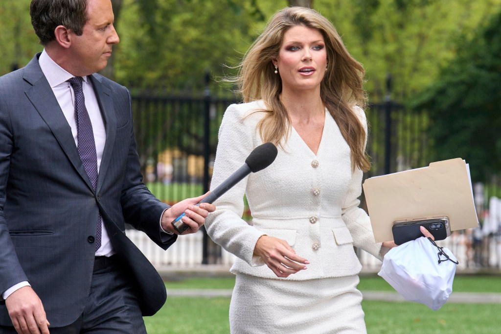 Lindsey Halligan, special assistant to the president, speaks with a reporter outside of the White House.