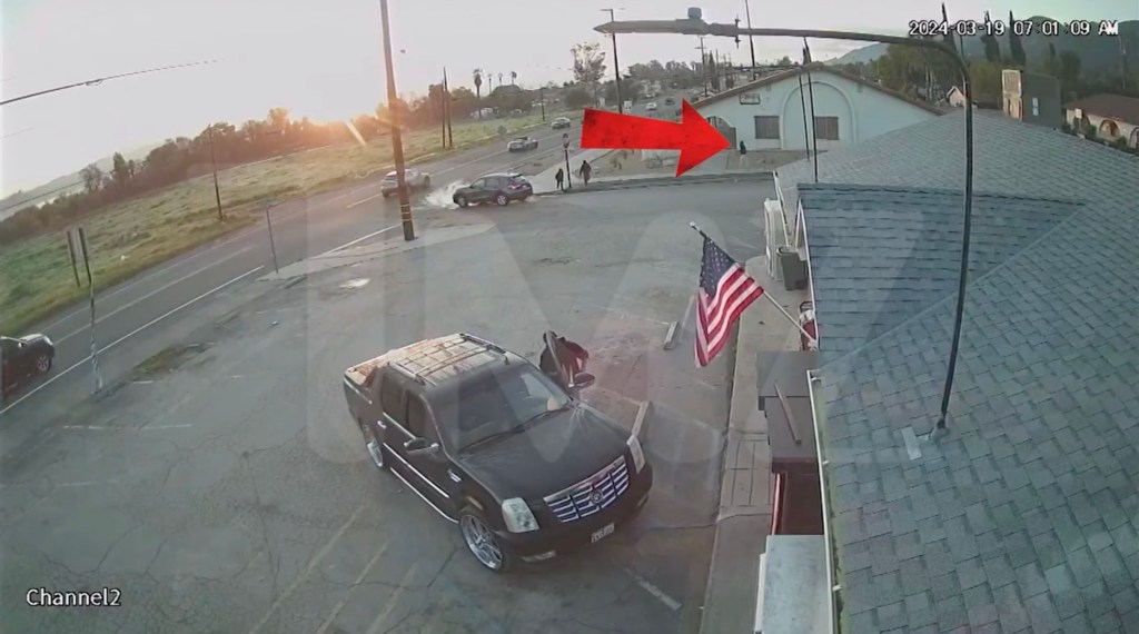 The young girl is seen walking quickly down the street and jogging around a corner before disappearing from view.