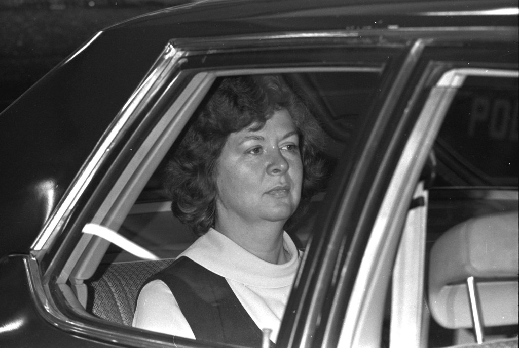 Sara Jane Moore in the backseat of a car.