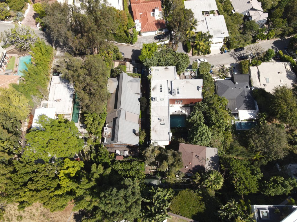 Around a half-dozen firefighters put out the fire which was described as abutting the side of Kimmel's home.