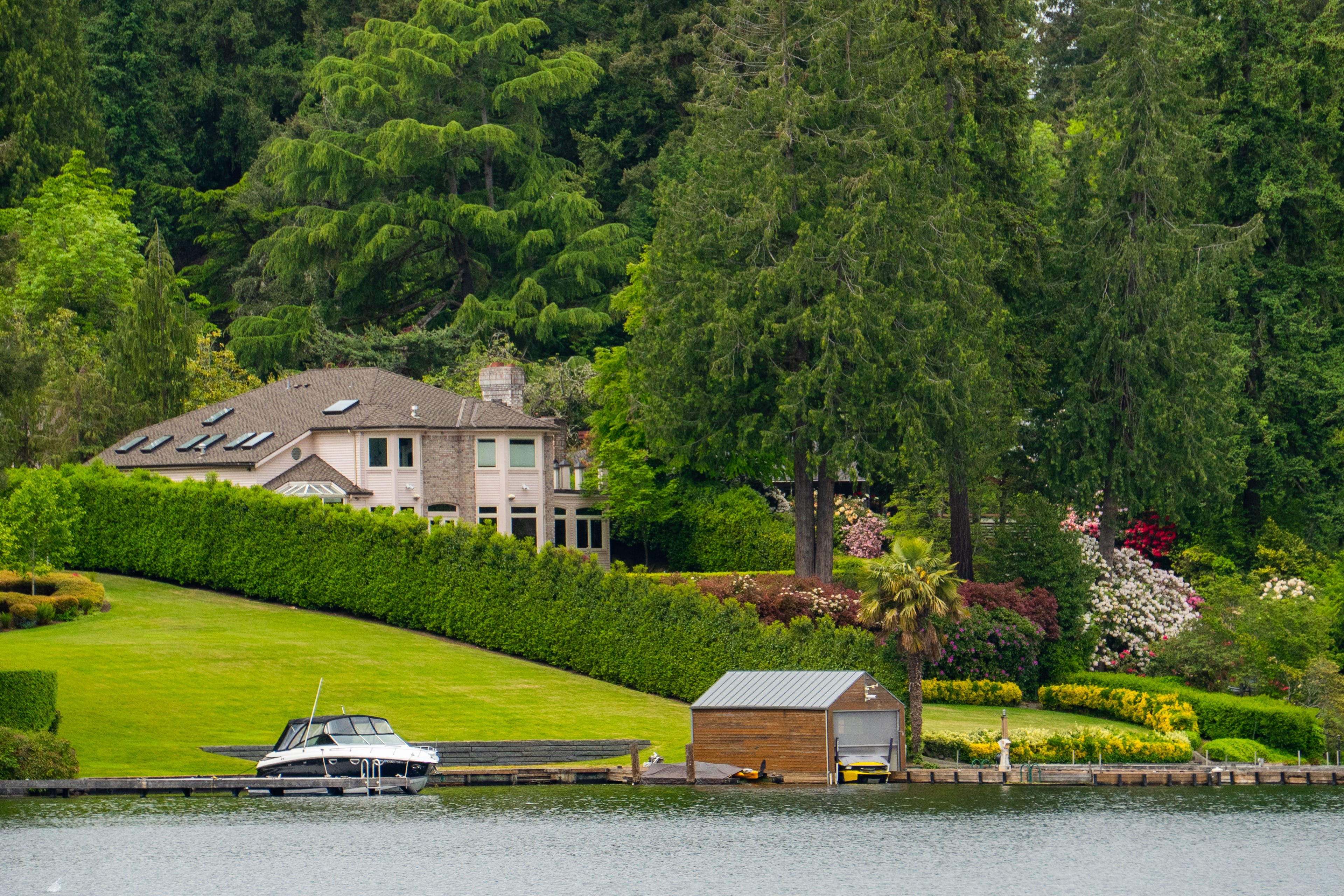 Homes on the waterfront in Medina, Washington, with extravagant landscaping