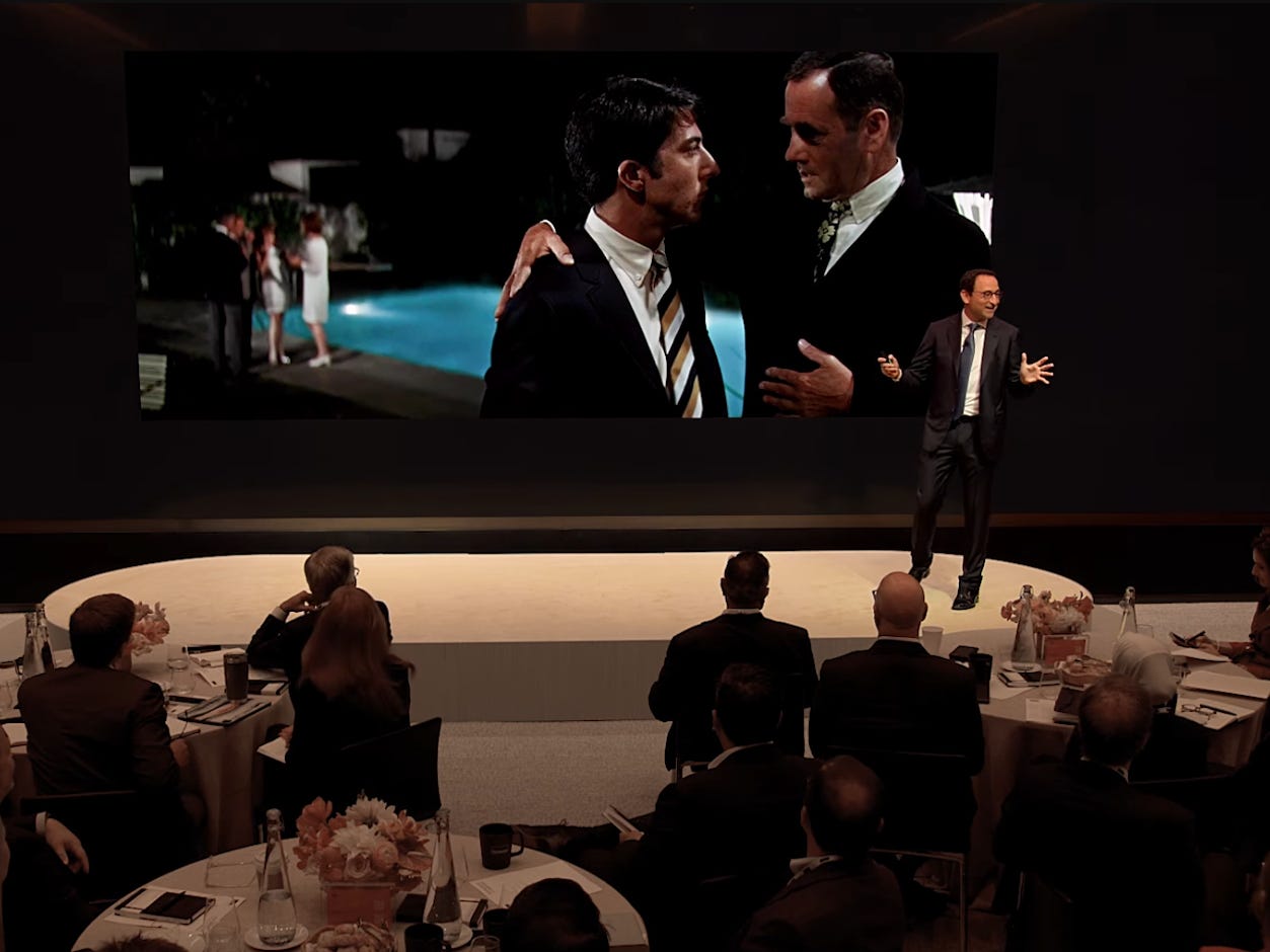 Jon Gray of Blackstone standing in front of the firm's edit to an iconic scene in The Graduate.