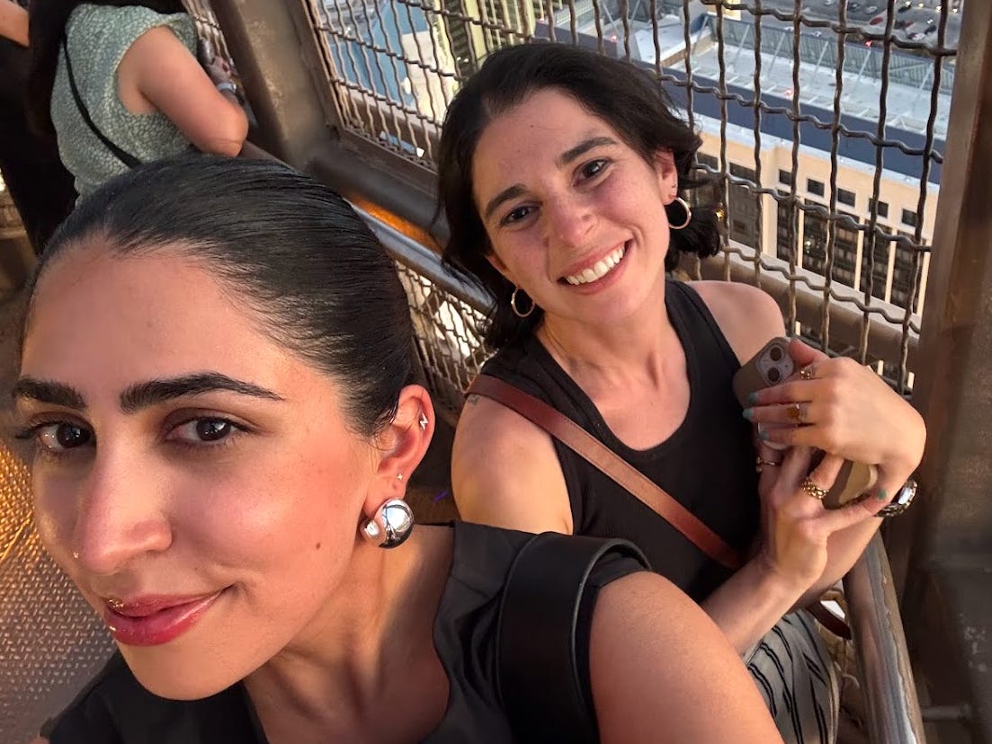 The writer and her friend atop the Eiffel Tower Experience in Las Vegas.