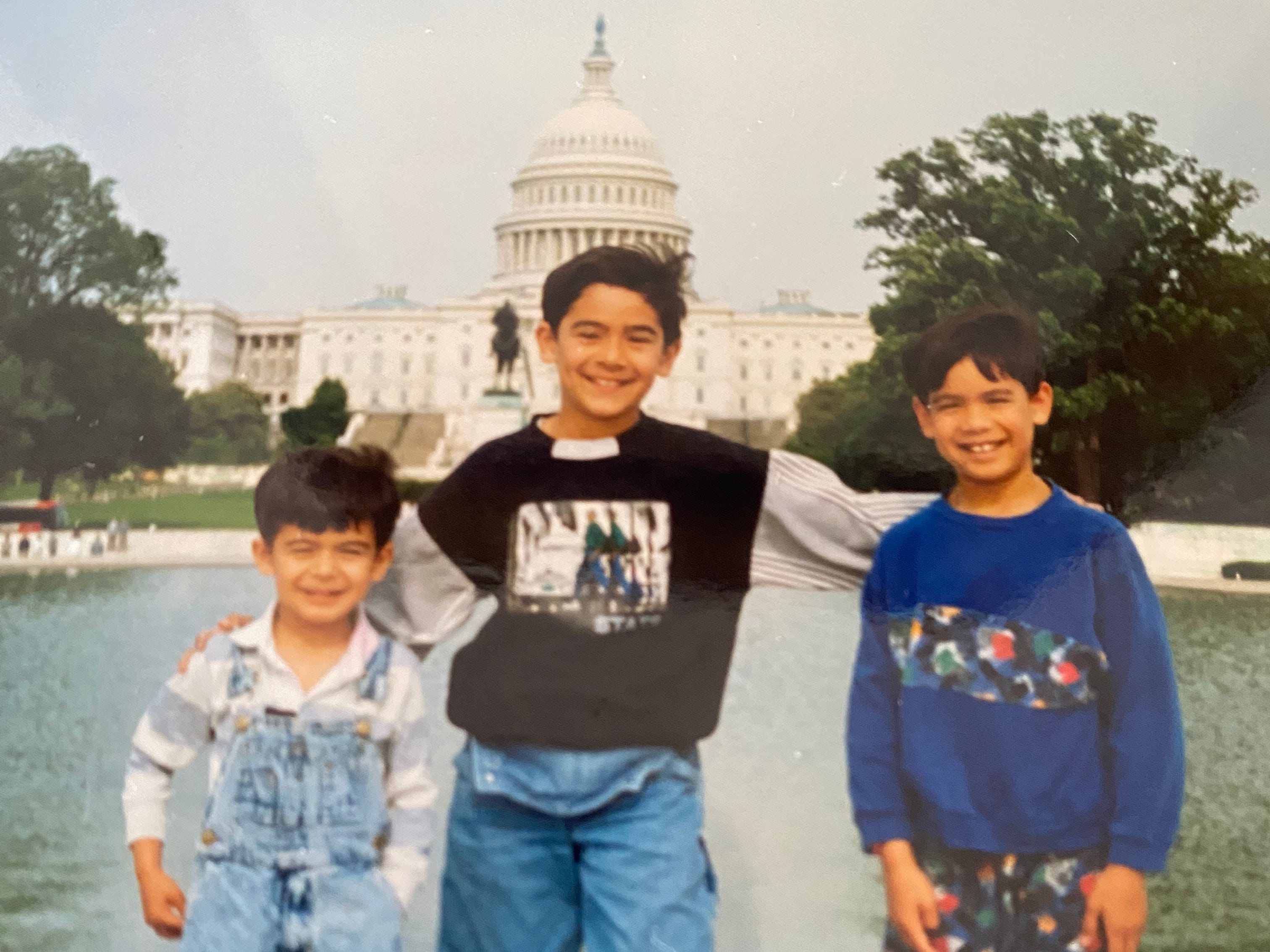 Kids posing with White House