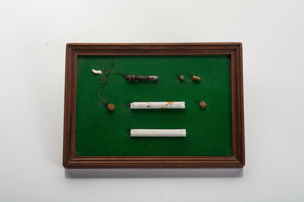 SOE cigarette pistol display.