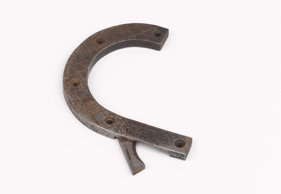 Retractable knife blade concealed in a boot heel.