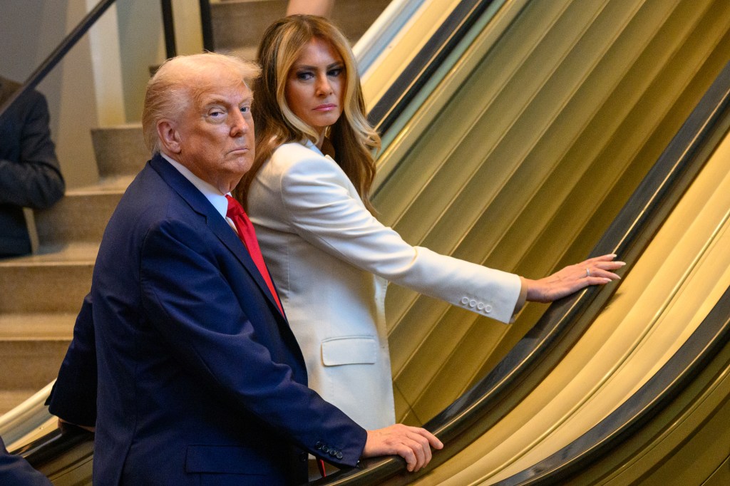 U.S. President Donald Trump and first lady Melania Trump on an escalator at the UN General Assembly.