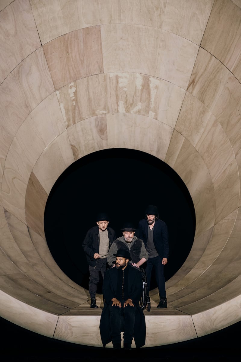 Alex Winter as ‘Vladimir,’ Brandon J. Dirden as ‘Pozzo’ (seated on stage), Michael Patrick Thornton as ‘Lucky’ (in wheel chair), and Keanu Reeves as ‘Estragon.’