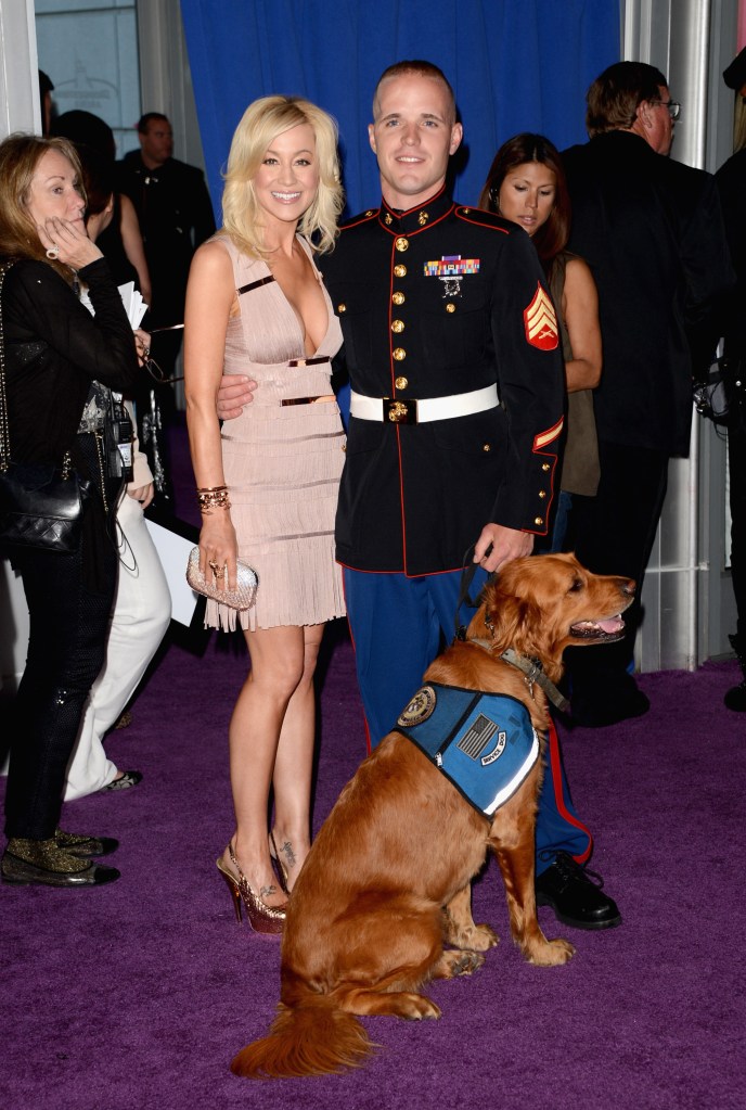 Singer Kellie Pickler and Sgt. Sean DeBevoise (Ret.) arrive at the 2012 CMT Music Awards.