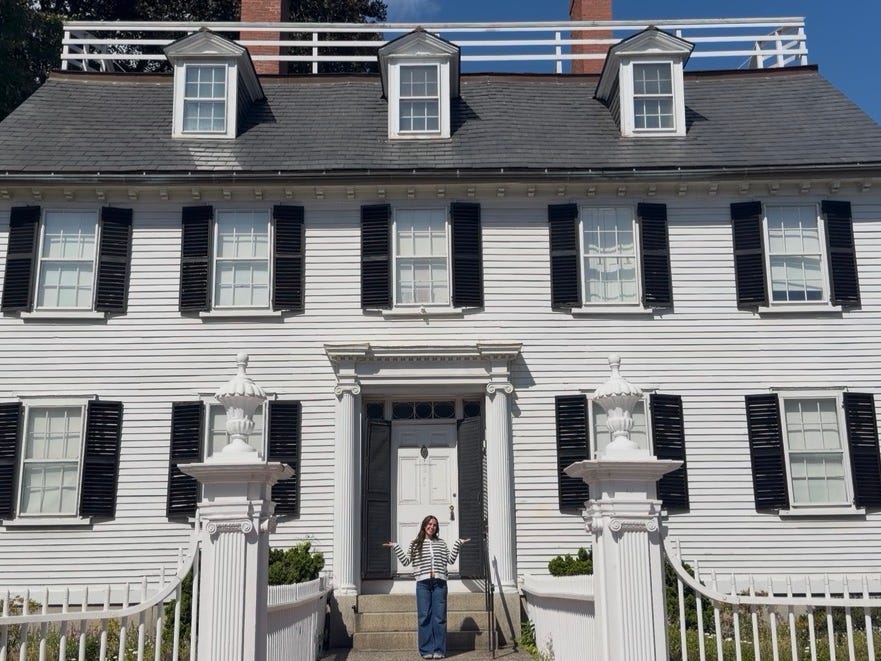 Amanda standing in front of Ropes Mansion in Salem, Massachusetts.