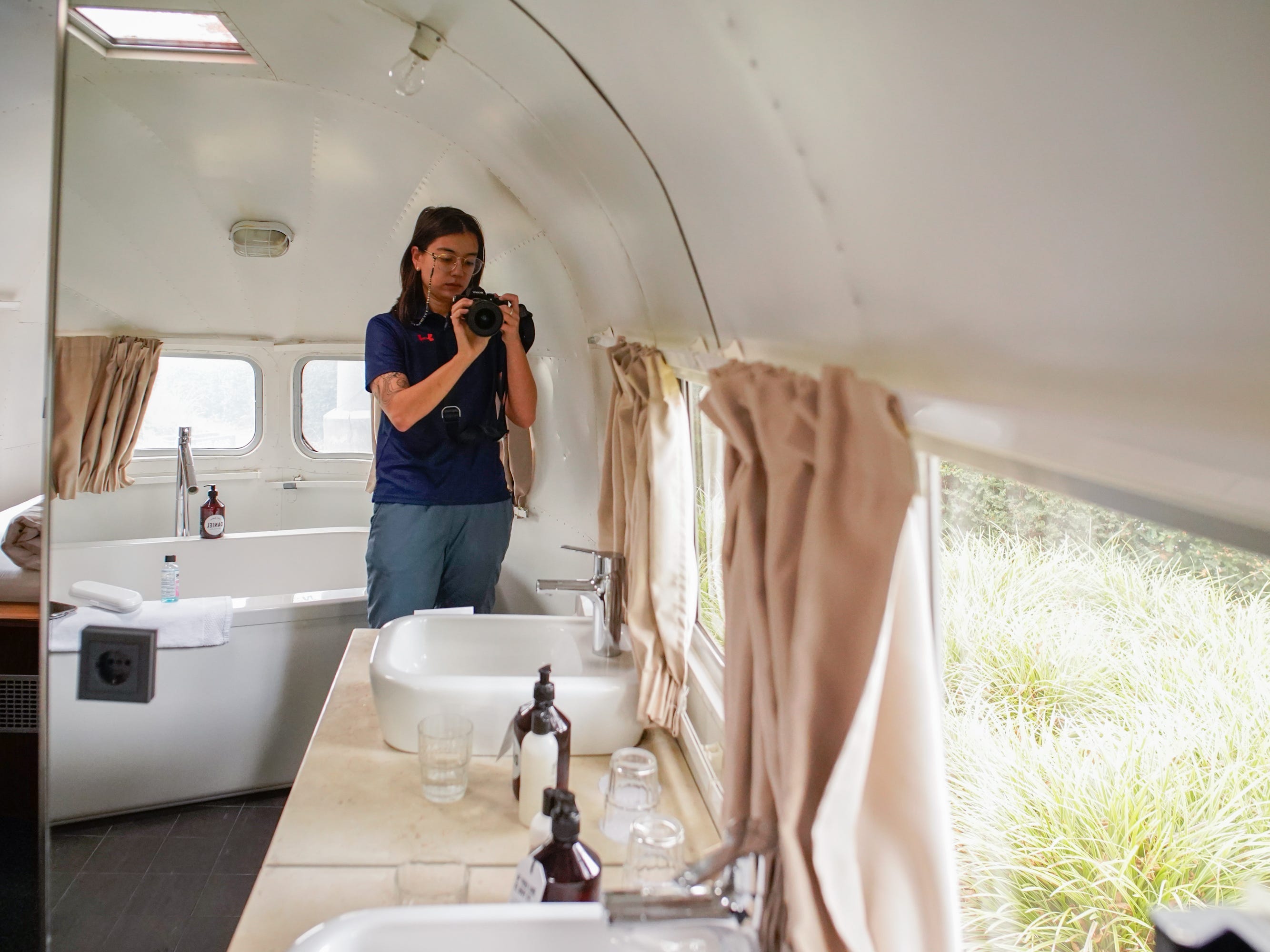 The author in front of the full-length mirror in the trailer.