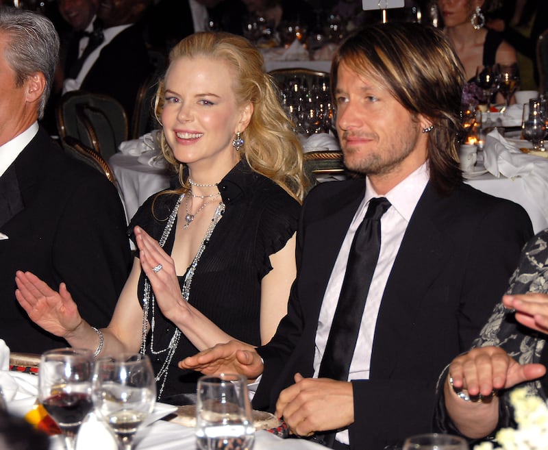 (EXCLUSIVE, Premium Rates Apply) Goodwill Ambassador Nicole Kidman and Keith Urban play drums led by Drum Cafe NY during UNIFEM's 30th Anniversary Celebration hosted by Kidman in the Grand Ballroom of the Hilton in New York City on May 13, 2006.  ***EXCLUSIVE COVERAGE*** (Photo by Kevin Mazur/WireImage)