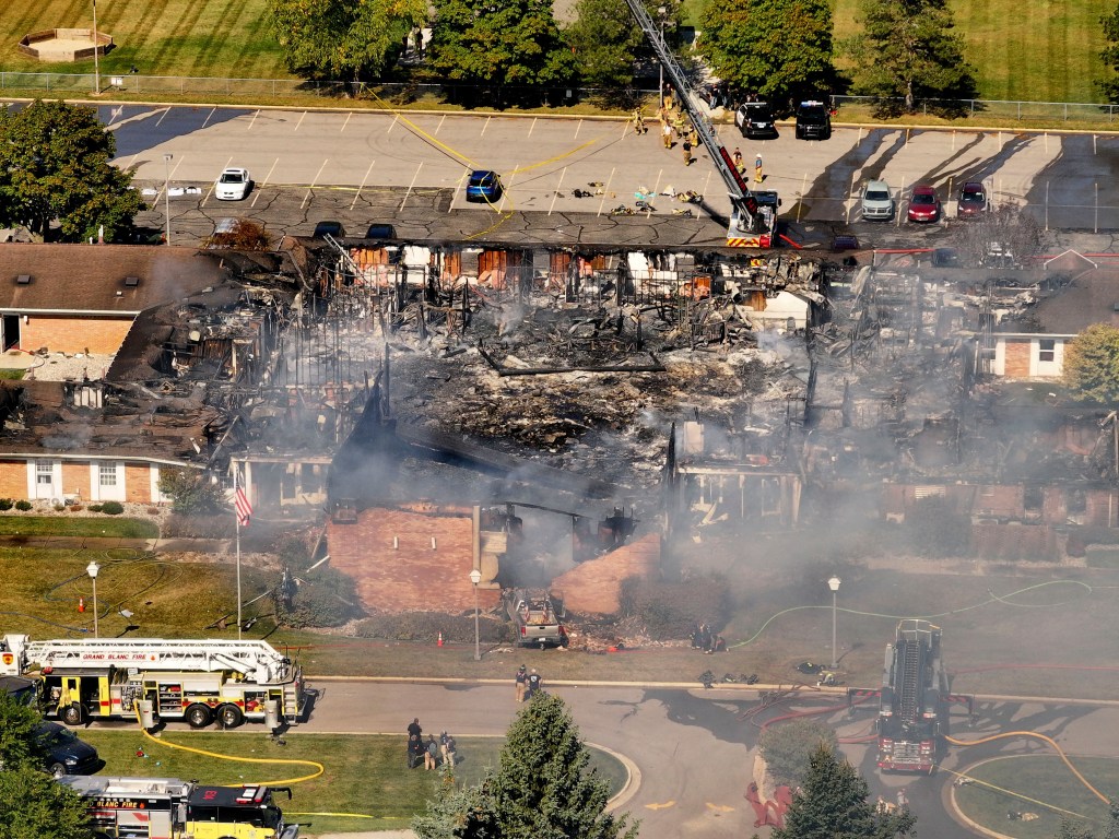 Aerial view of emergency crews responding to a shooting and fire at The Church of Jesus Christ of Latter-day Saints.