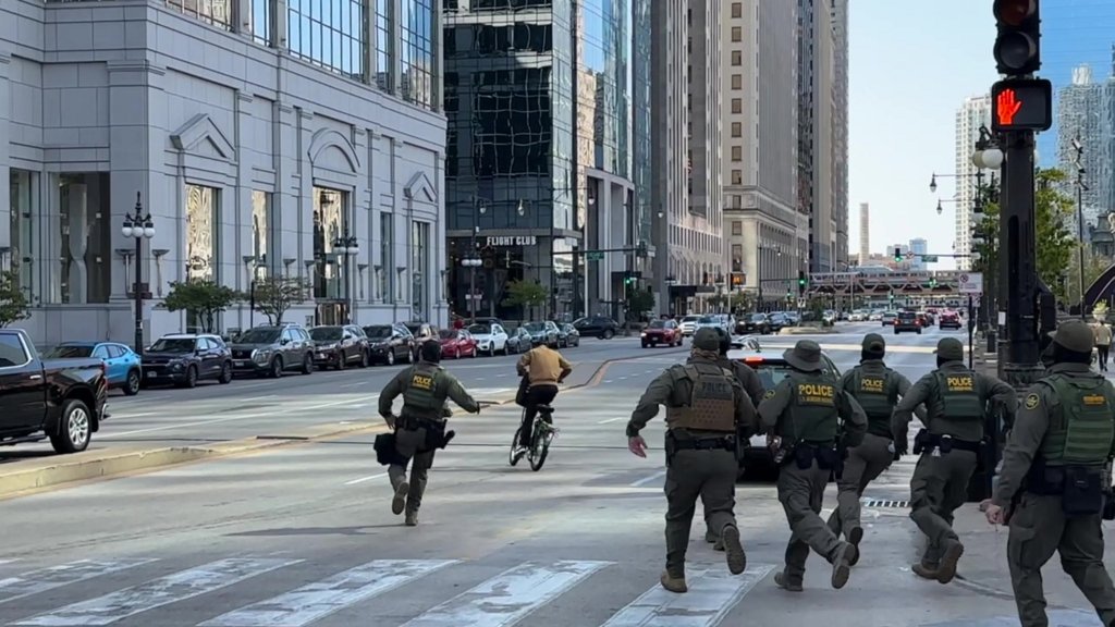 The agents then chase him down the street, but the cyclist was able to escape and ride off.