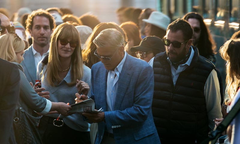 Laura Dern as Liz, George Clooney as Jay Kelly, and Adam Sandler as Ron Sukenick in Jay Kelly.