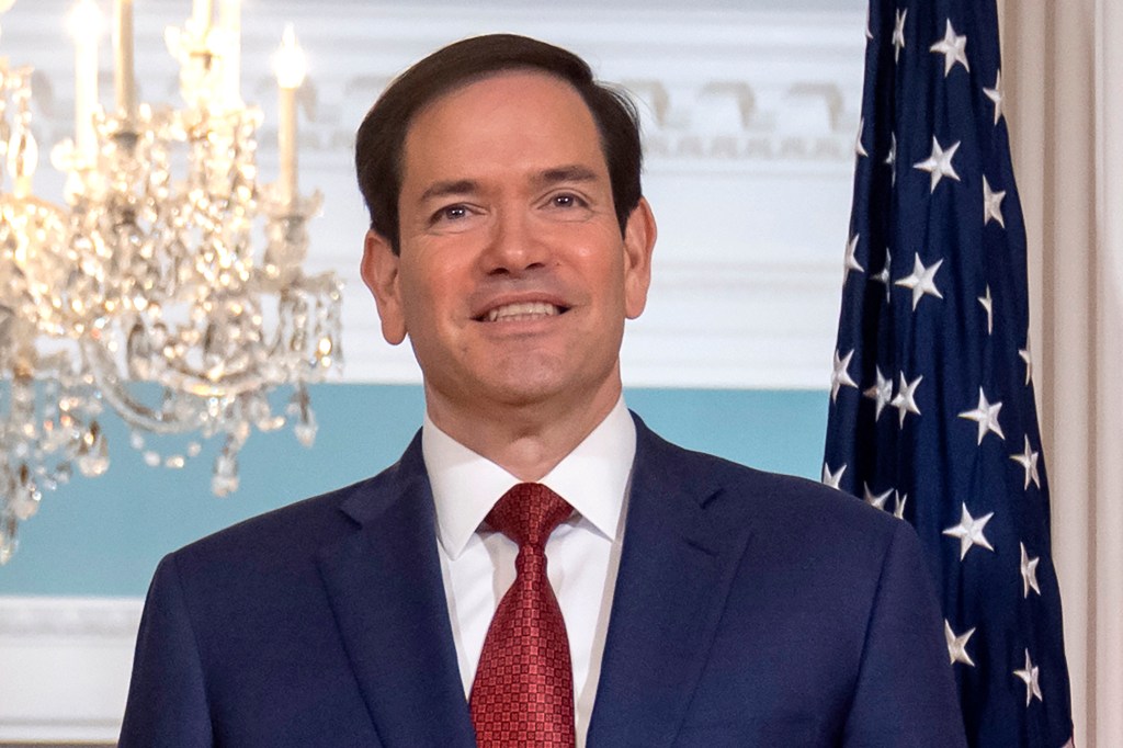Secretary of State Marco Rubio stands at the State Department.