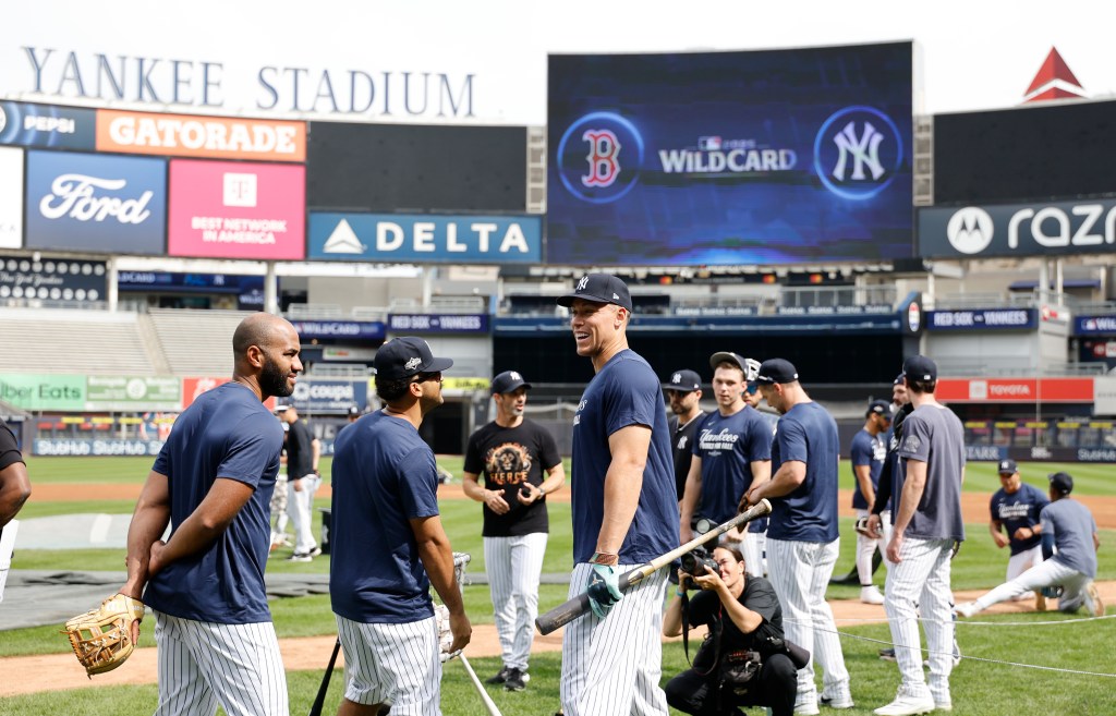 New York Yankees right fielder Aaron Judge (C) and his teammates are seen during the wild card practice at Yankee Stadium before their Wild Card game against the Boston Red Sox.