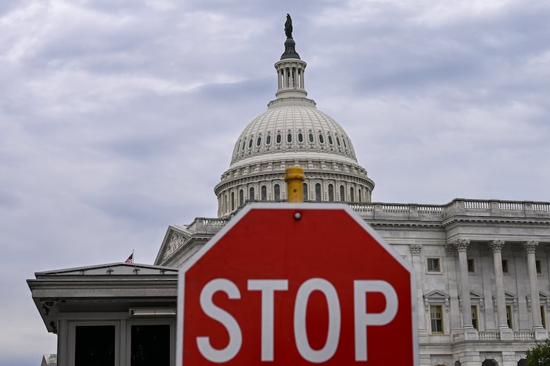 The U.S. government barreled towards its first shutdown in six years Tuesday night, with funding expiring at midnight barring a breakthrough on deadlocked negotiations between Democrats and Republicans.