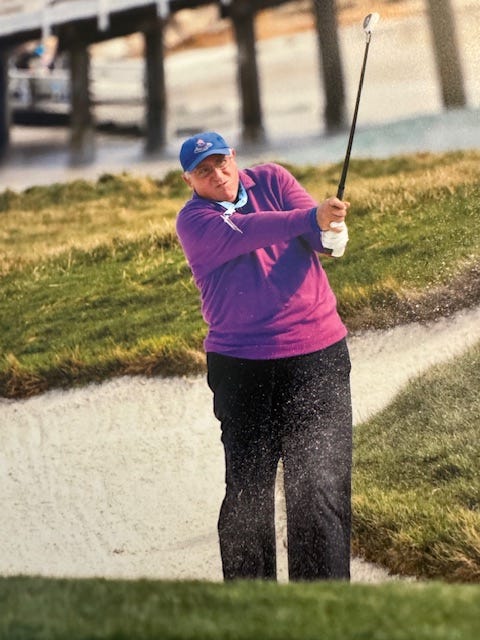 a older man plays golf outdoors