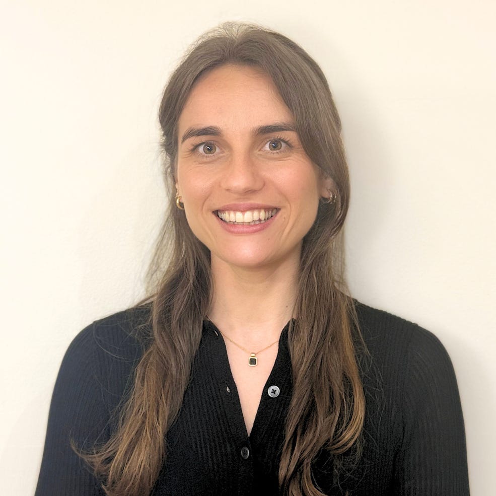 A woman smiling.