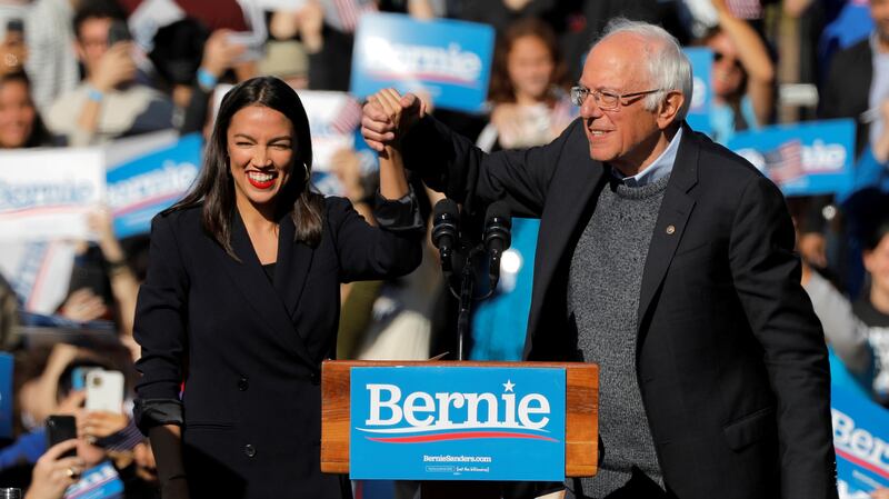 U.S. Rep. Alexandria Ocasio-Cortez (D-NY) introduces Democratic 2020 U.S. presidential candidate and U.S. Senator Bernie Sanders (I-VT) during the 