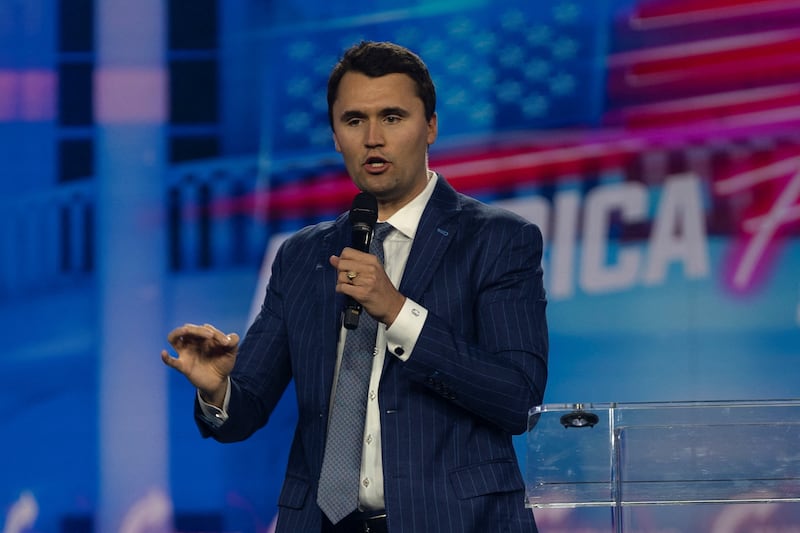 Charlie Kirk speaking at a Turning Point USA event.