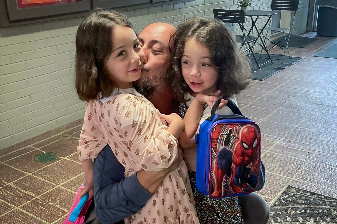 Ilya Brunshteyn with two daughters