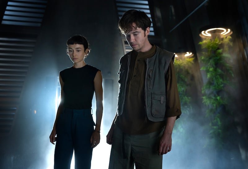 (L-R) Sydney Chandler as Wendy and Alex Lawther as Hermit.