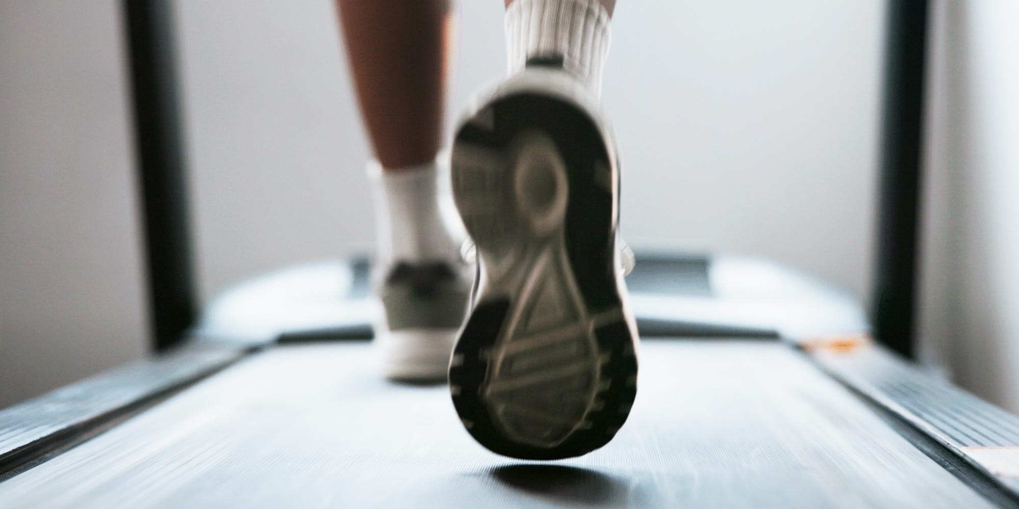 A GIF of someone running on a treadmill