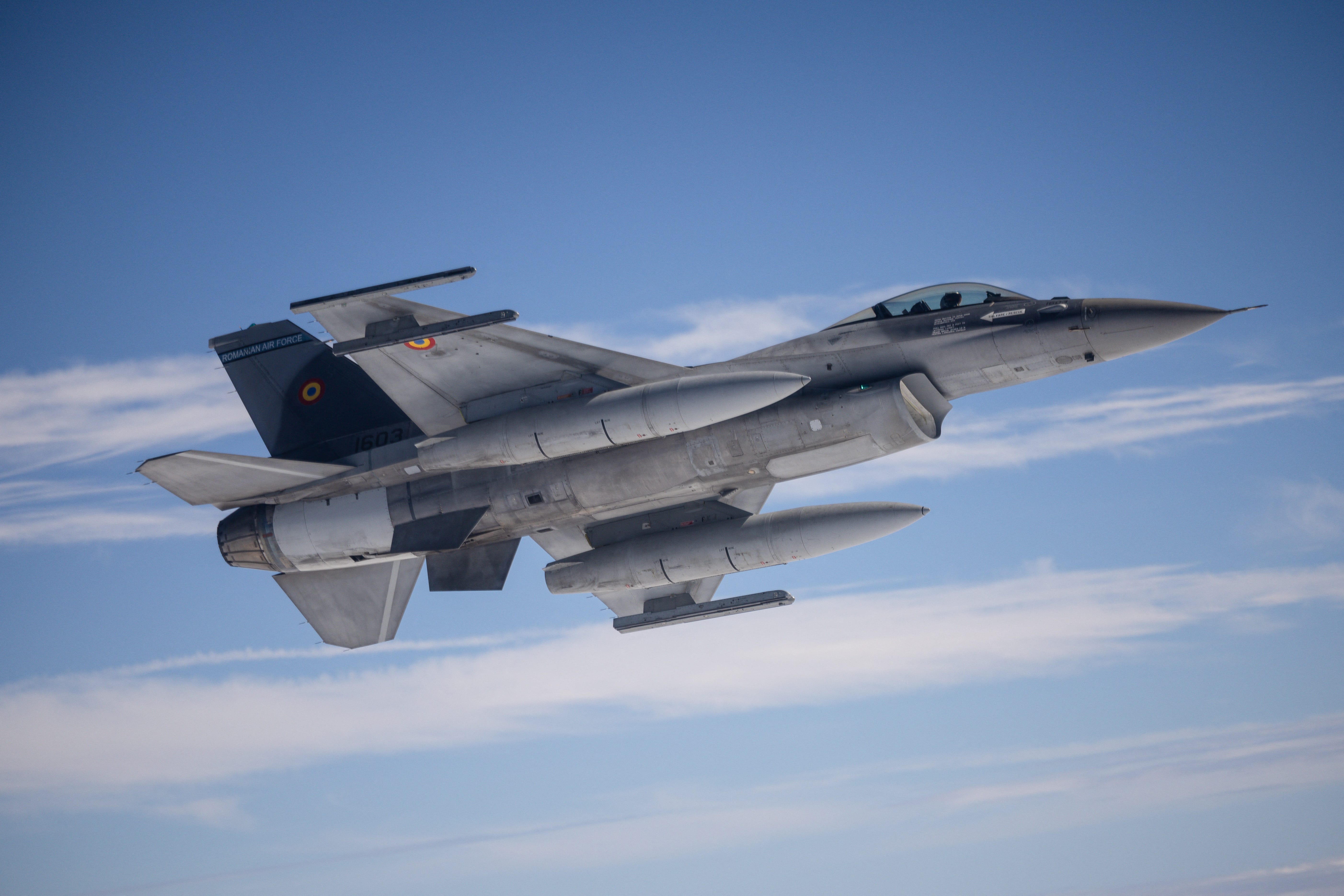 A Romanian F-16 awaits refueling during an exercise.