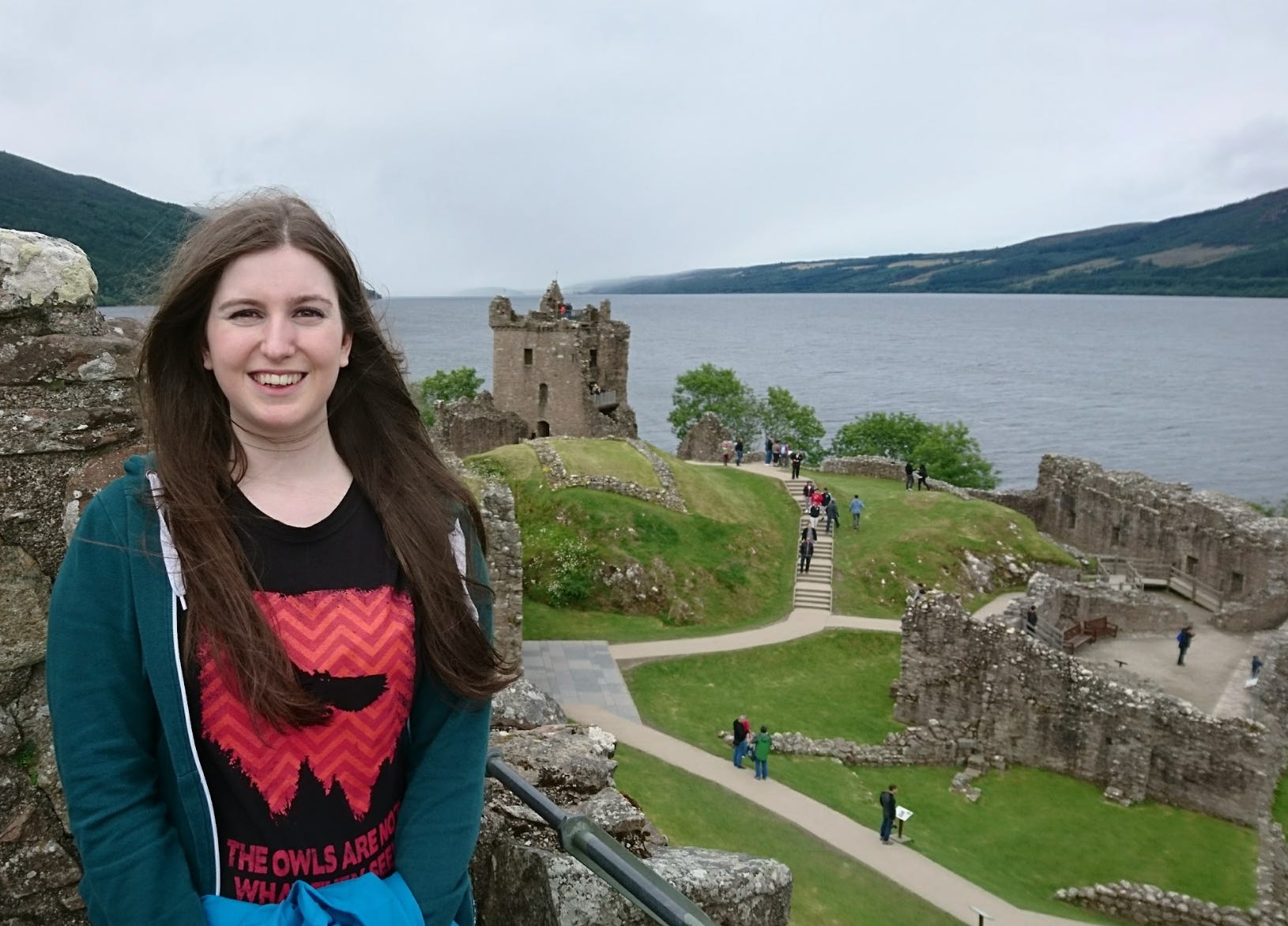 The writer standing in front of Urquhart Castle in Scotland.
