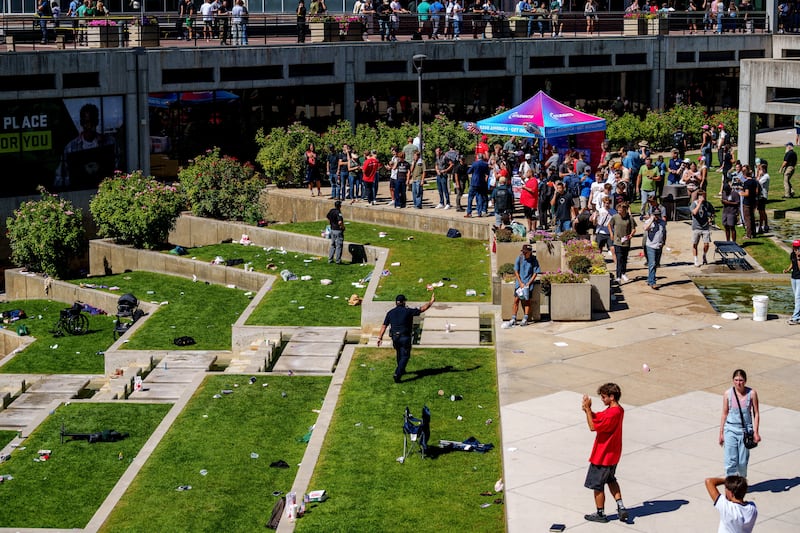 The scene after right-wing activist and commentator Charlie Kirk was shot at a Utah Valley University speaking event in Orem, Utah, on Sept. 10, 2025.