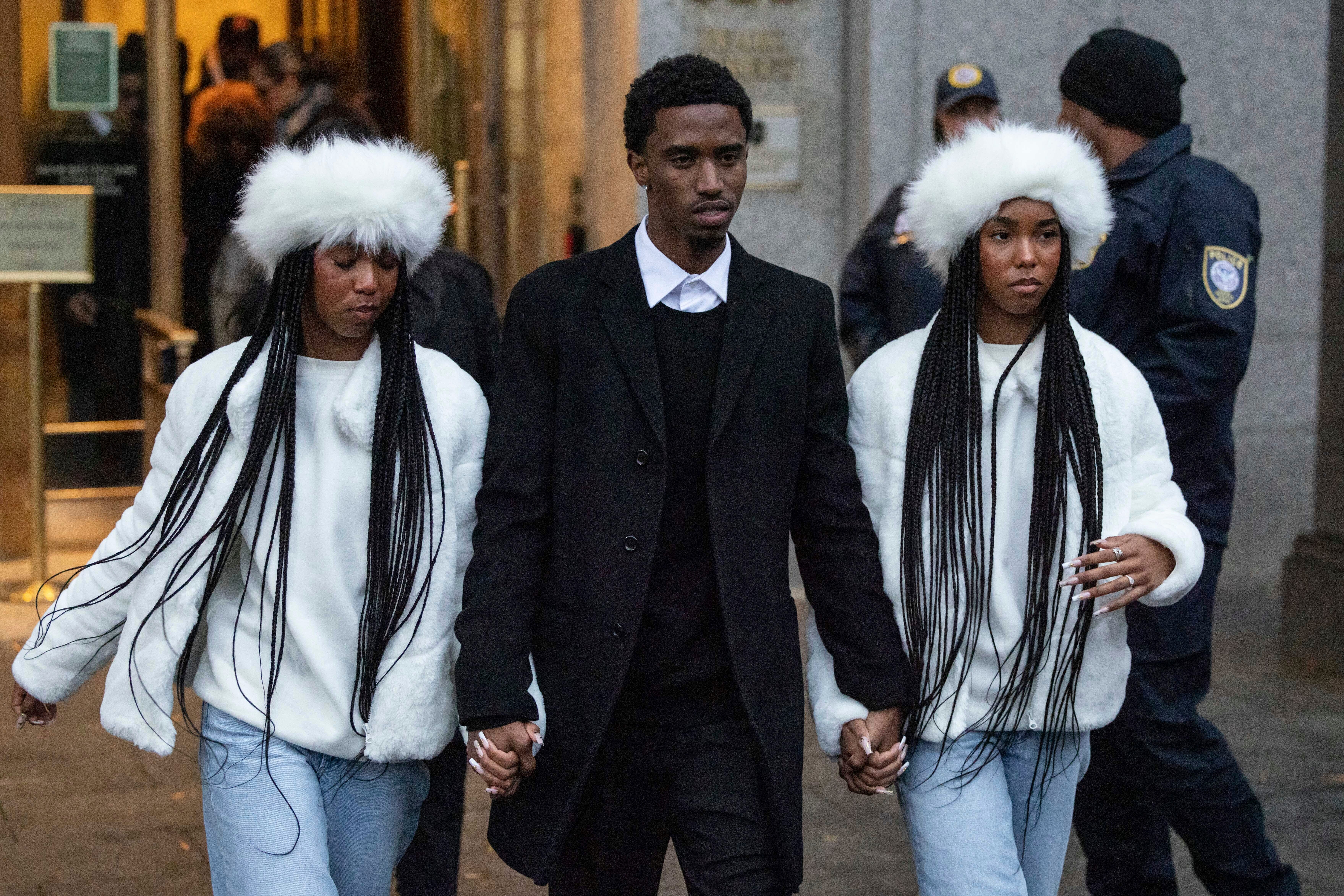 King Combs, center, son, D'Lila Combs and Jessie Combs, daughters of Sean 