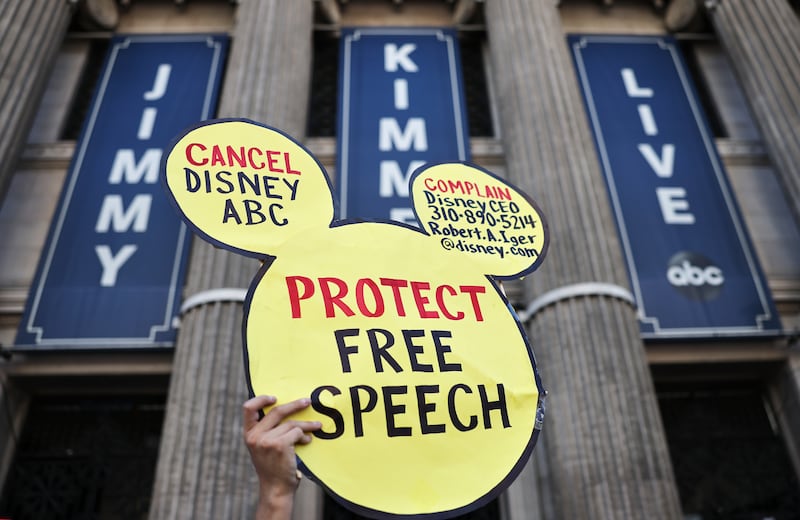 A demonstrator waves a 
