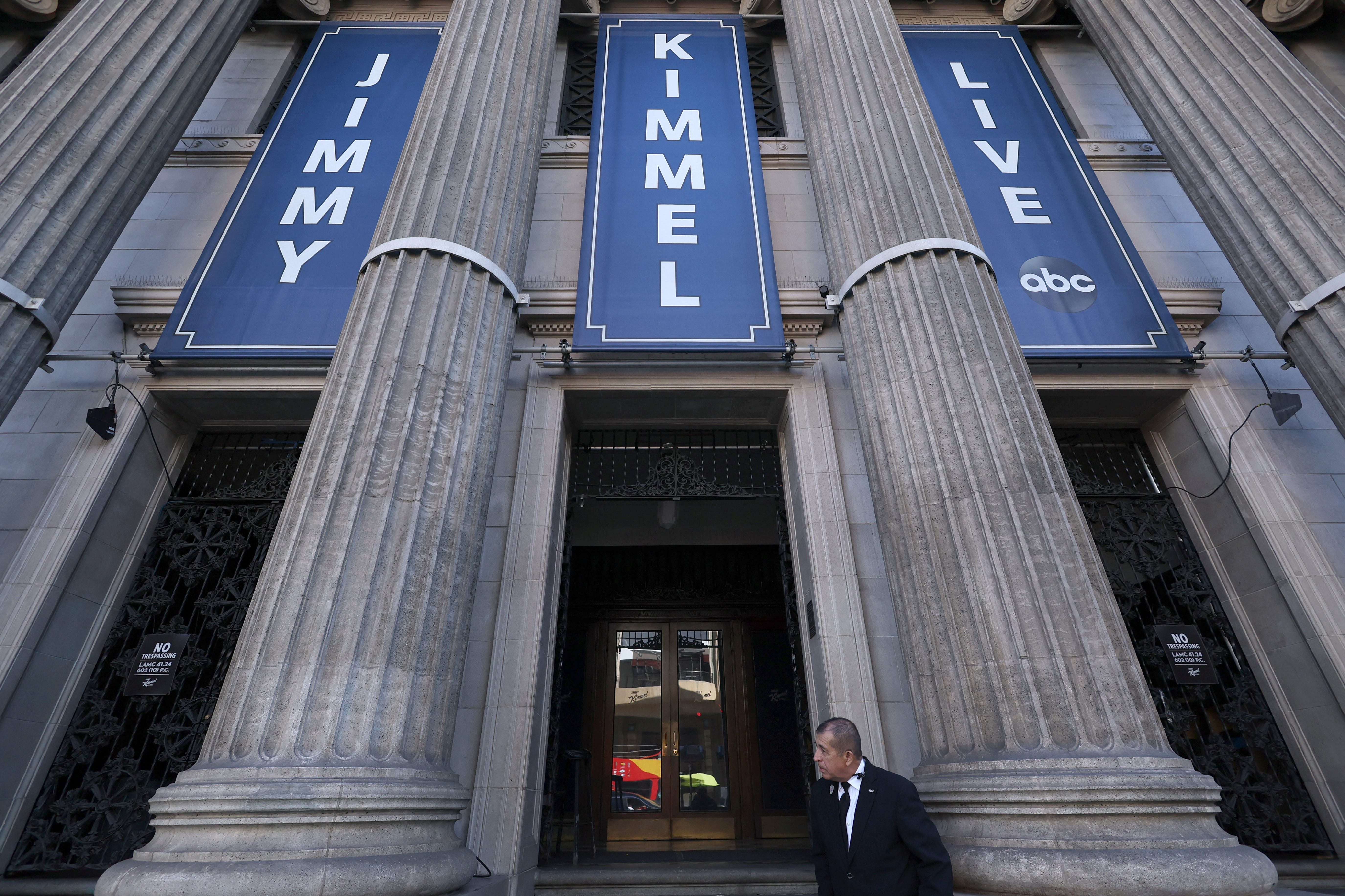 A security guard stands outside ahead of the taping of the late-night talk show Jimmy Kimmel Live! at the Hollywood Masonic Temple in Los Angeles