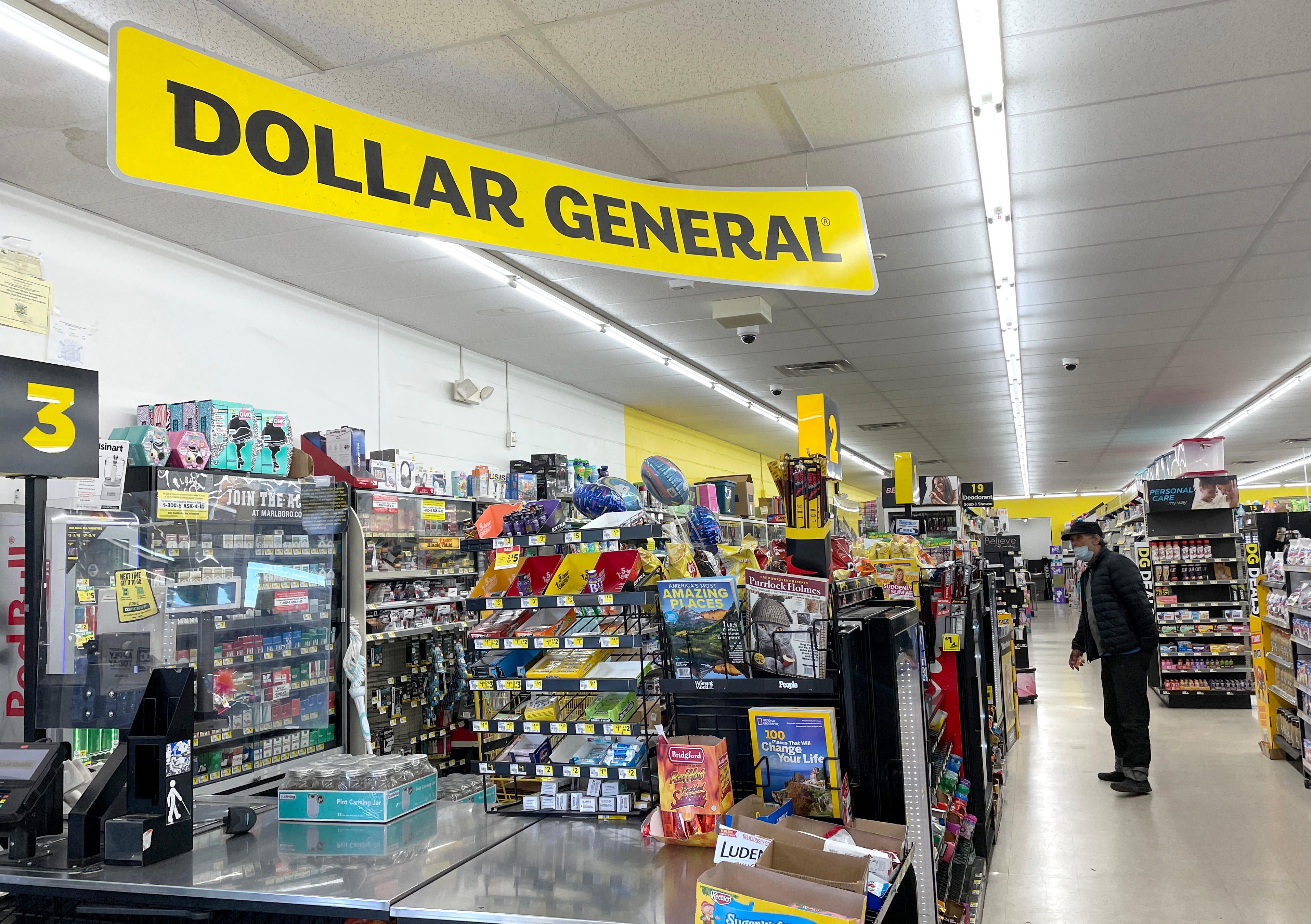 A customer shops at a Dollar General store.