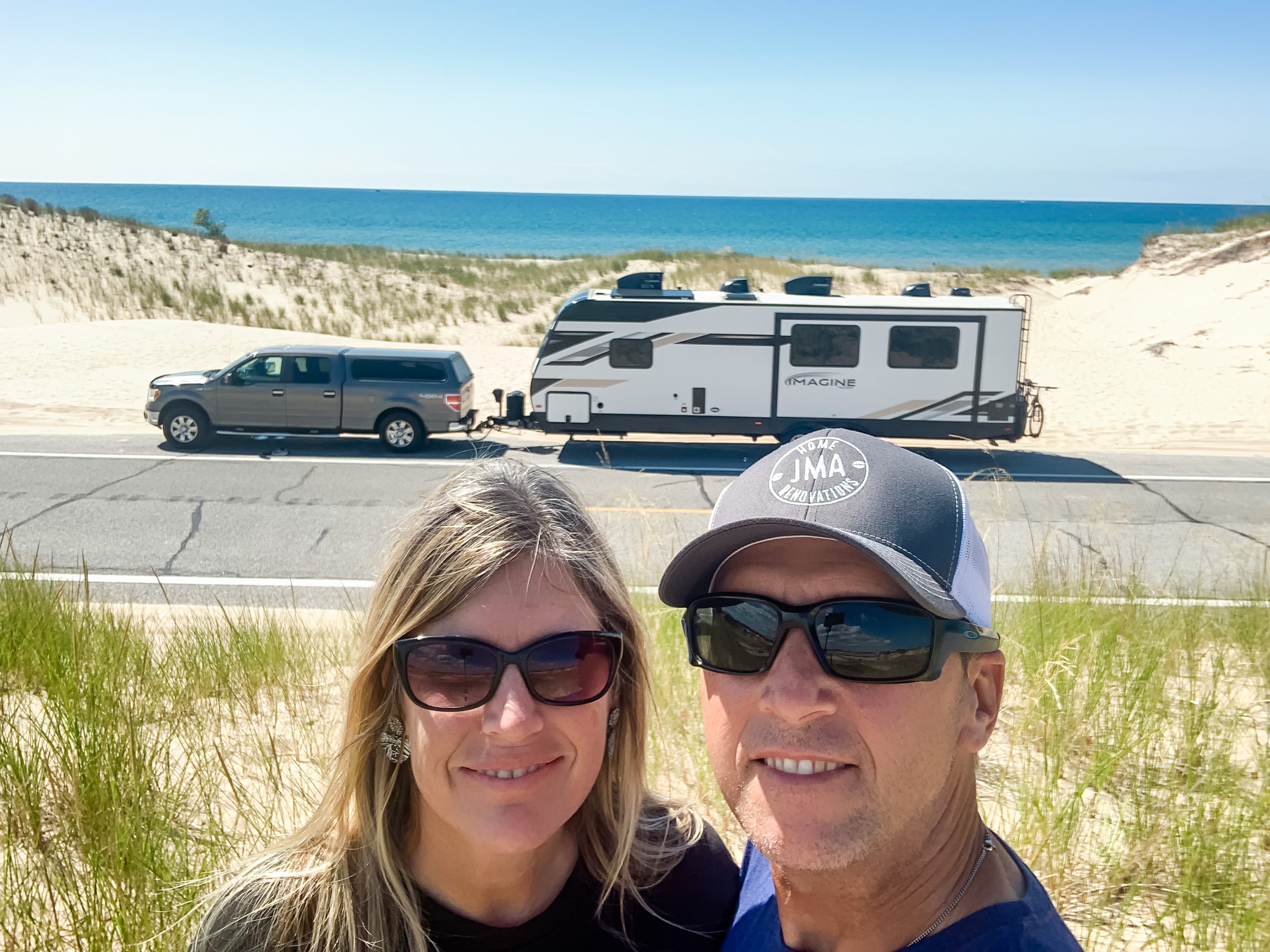 Laurie and Matt DuShane with their RV and truck.