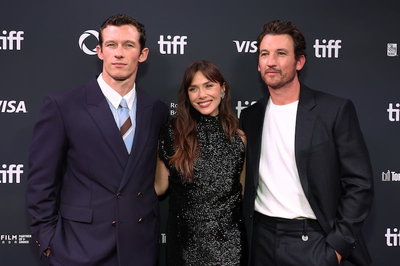 Callum Turner, Elizabeth Olsen, and Miles Teller attend the premiere of "Eternity" during the 2025 Toronto International Film Festival on September 07, 2025