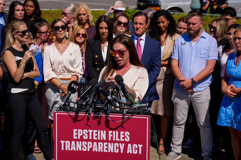 Haley Robson and other Epstein survivors speak at a press conference outside the US capitol