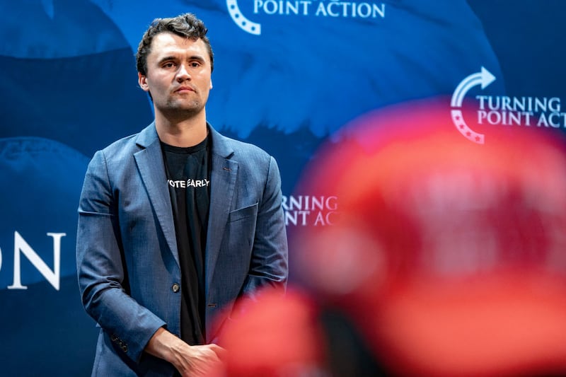 Conservative political activist Charlie Kirk, founder of Turning Point Action, speaks during a meeting on the campus of the University of Arizona in Tucson on October 17, 2024. Charlie Kirk's Turning Point Action, a conservative campaign group, is working extra hard to get Republican Donald Trump elected, and has hired thousands of canvassers to get out the vote. (Photo by Olivier Touron / AFP) (Photo by OLIVIER TOURON/AFP via Getty Images)