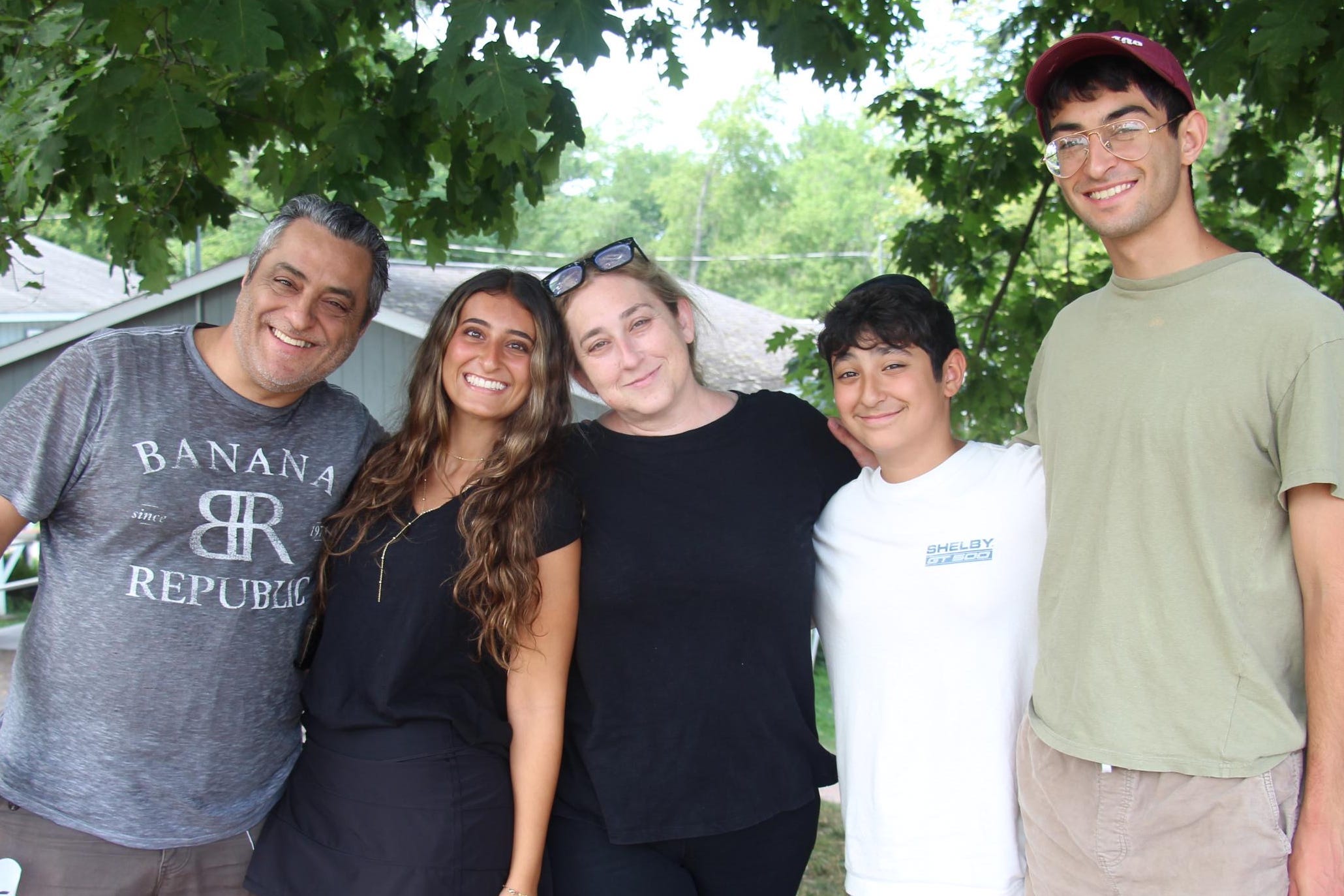 The author poses with her family.