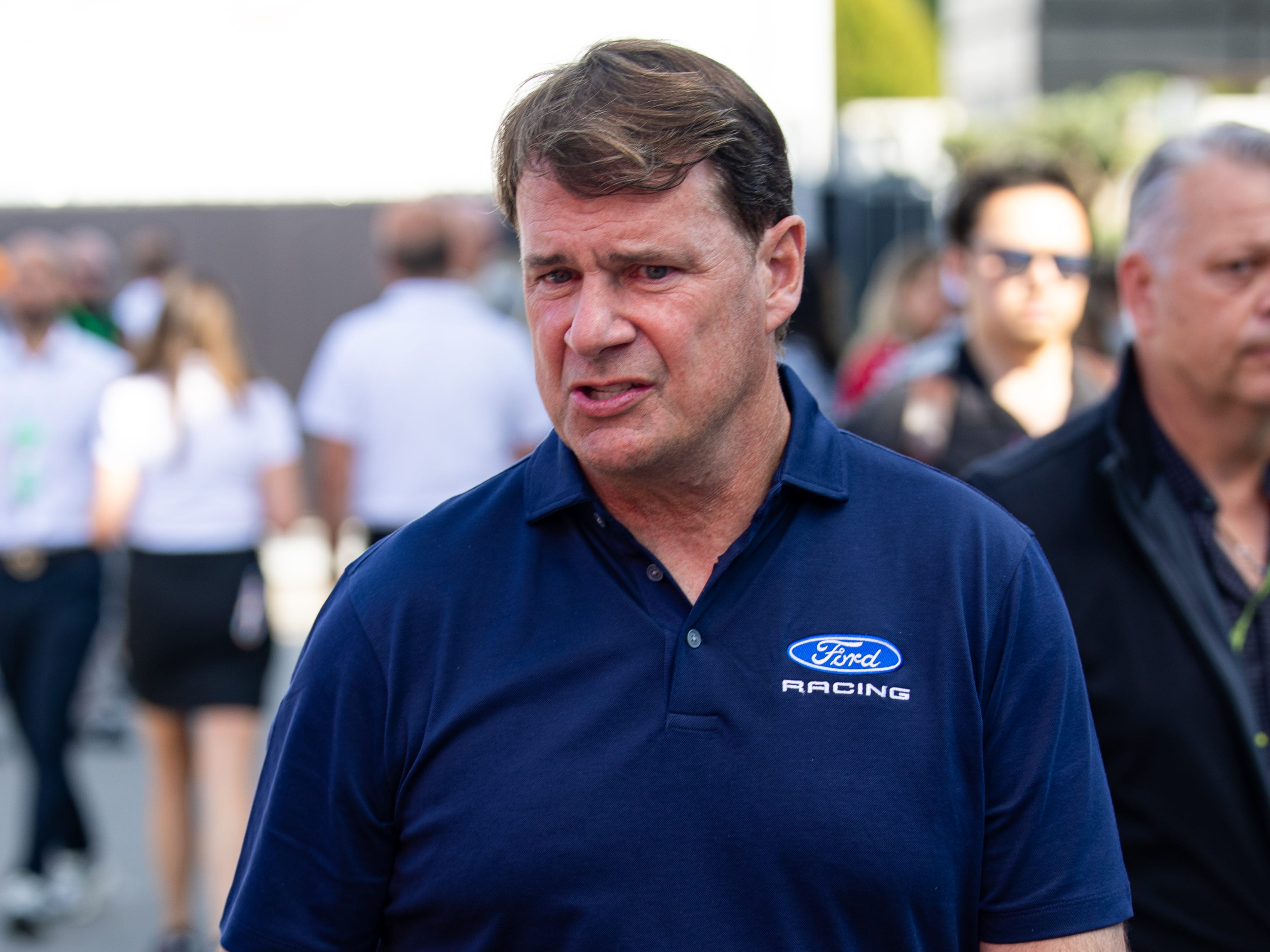 Ford CEO Jim Farley walks in the paddock at the F1 Grand Prix in Monza, Italy.