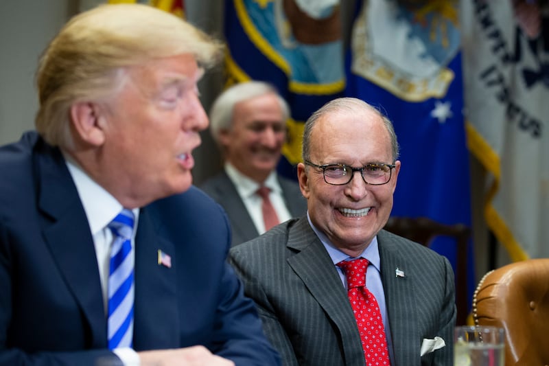 WASHINGTON, DC - MAY 11: (AFP OUT) Director of National Economic Council Larry Kudlow smiles as United States President Donald J. Trump speaks with reporters during a meeting with automotive industries executives in the Roosevelt Room of the White House on May 11, 2018 in Washington, DC. (Photo by Alex Edelman-Pool/Getty Images)