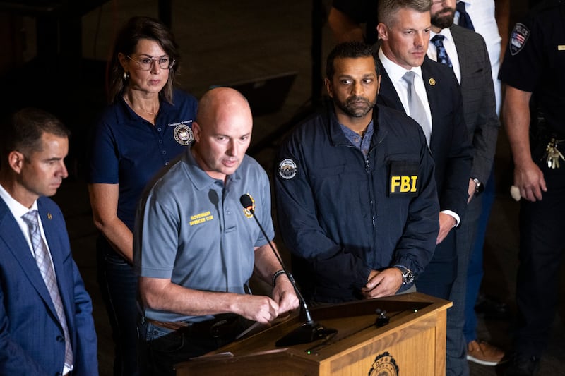 OREM, UTAH - SEPTEMBER 11: Governor of Utah Spencer Cox speaks at a press conference flanked by FBI director Kash Patel, Lieutenant Governor of Utah Deidre Henderson, and Commissioner Beau Mason following the fatal shooting of political activist Charlie Kirk during an event at Utah Valley University on September 11, 2025 in Orem, Utah.