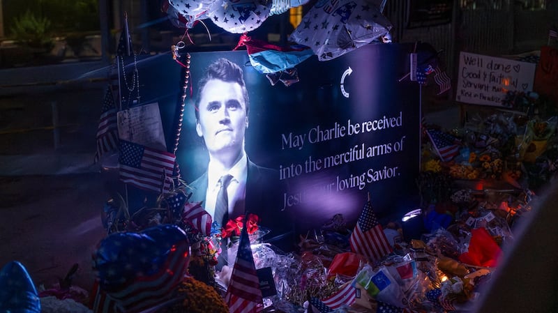 A poster of conservative activist Charlie Kirk is displayed at a memorial following the fatal shooting of Kirk, at the Turning Point USA headquarters in Phoenix, Arizona, U.S., September 12, 2025. REUTERS/Thomas Machowicz