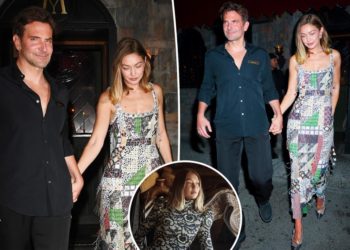 Gigi Hadid holds hands with Bradley Cooper as they celebrate her Vogue cover in NYC
