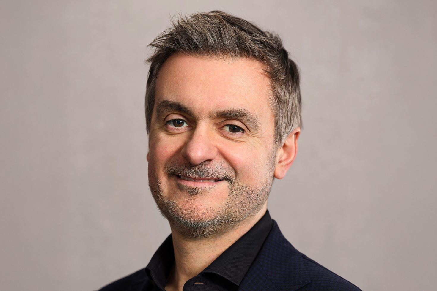 A man smiles